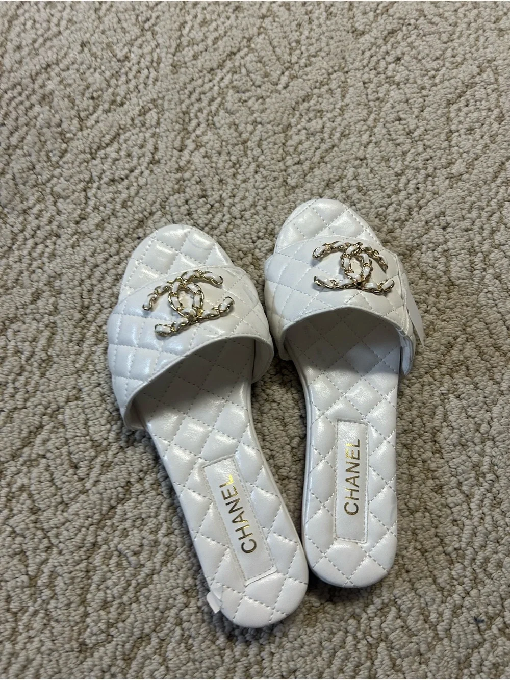 CHANEL White Quilted Slide Sandals with Gold CC Chain Emblem